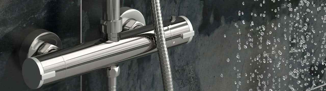 What is a thermostatic shower valve and how does it work?