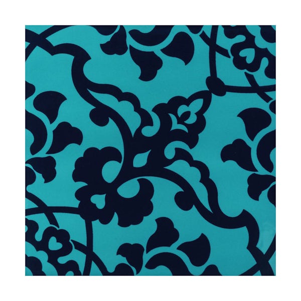 cut out of decorative turquoise V&A tile with black detail