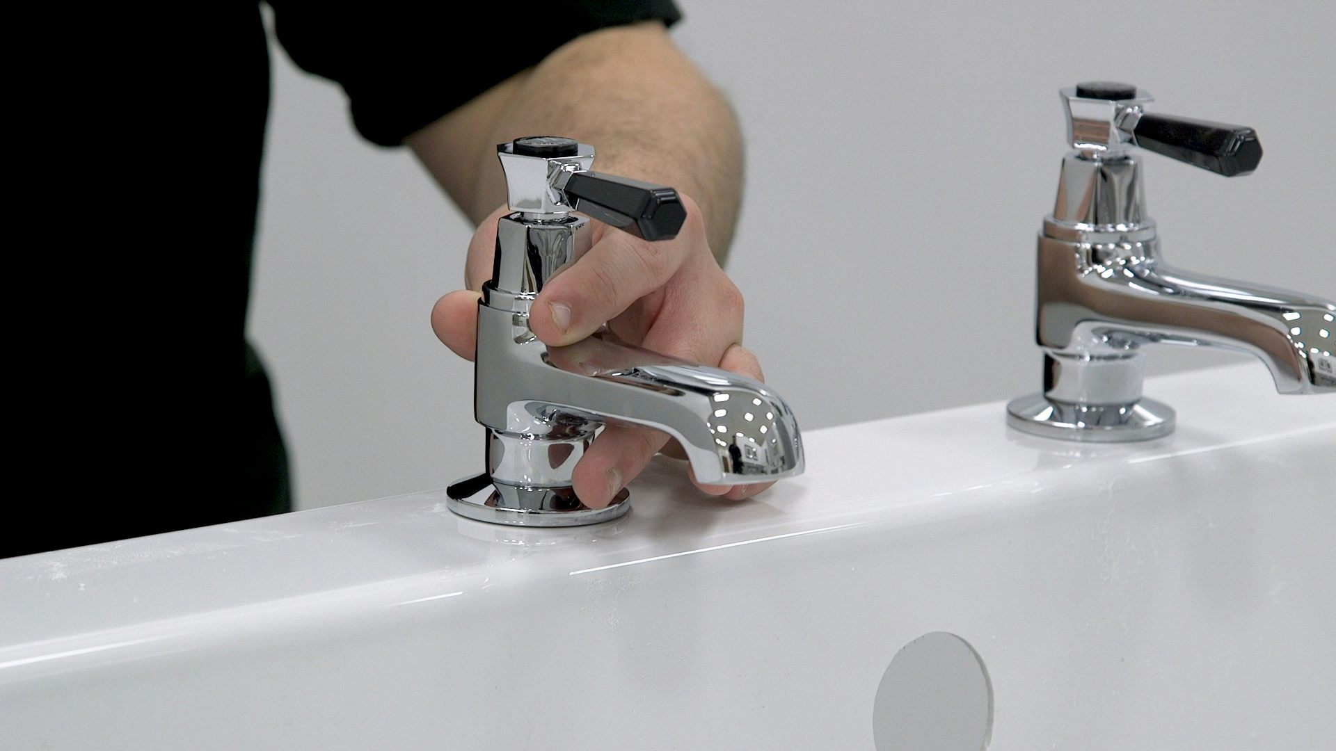 fitting new bathroom sink taps