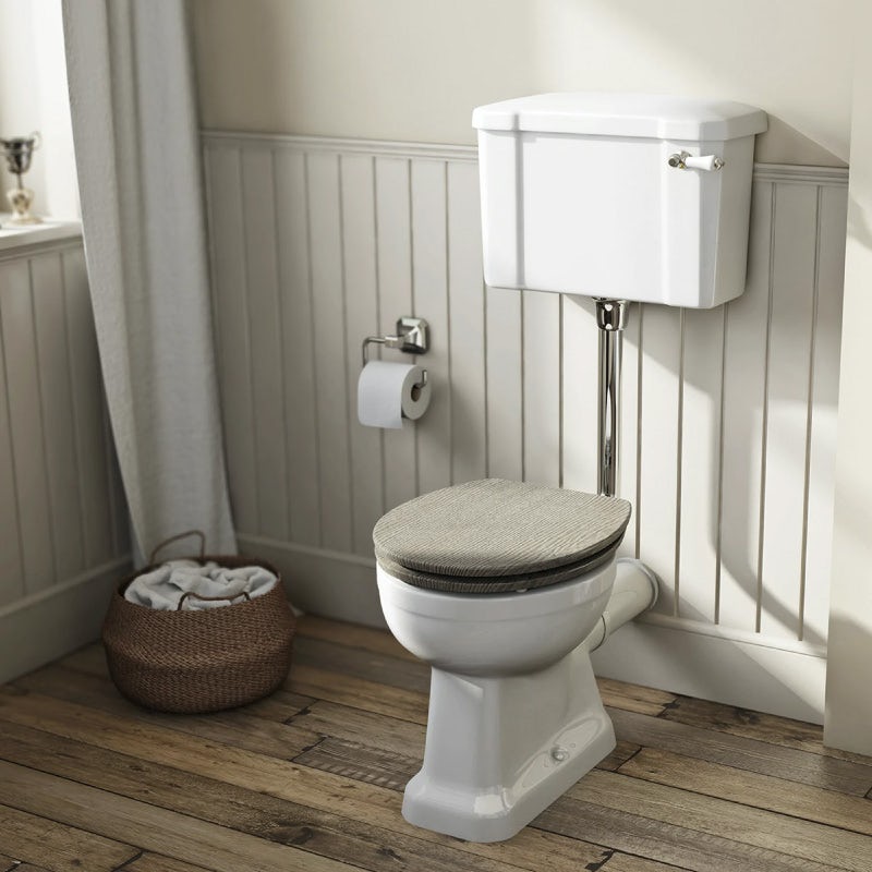 The Bath Co. Camberley low level toilet with wooden soft close seat limed oak effect