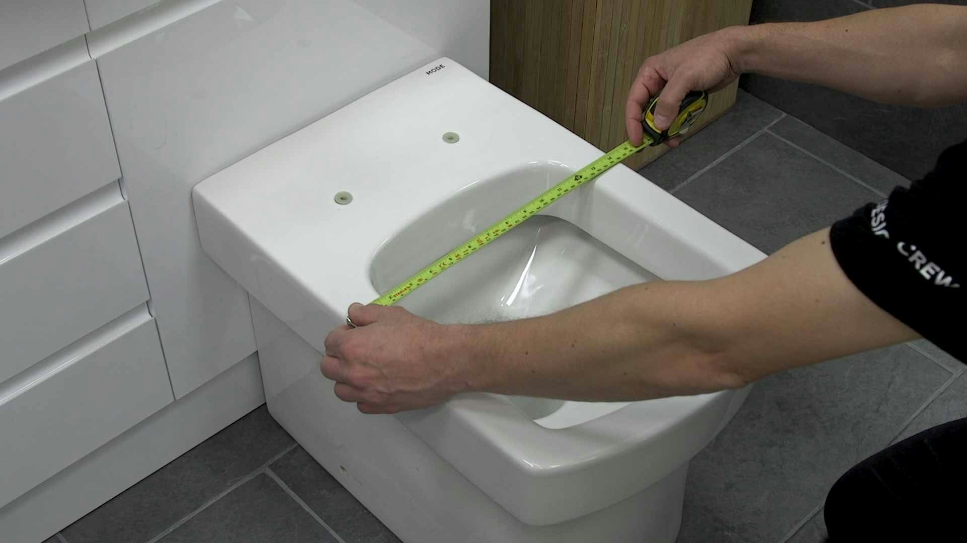 Measuring width of toilet