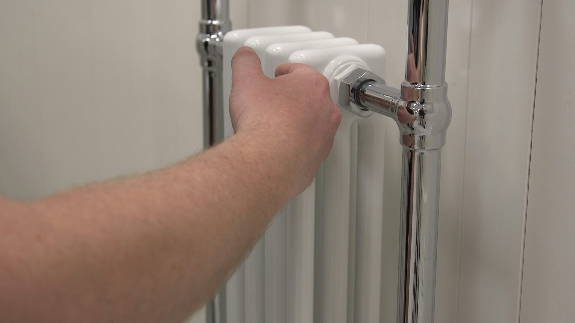 Check radiators or heated towel radiator for cold spots
