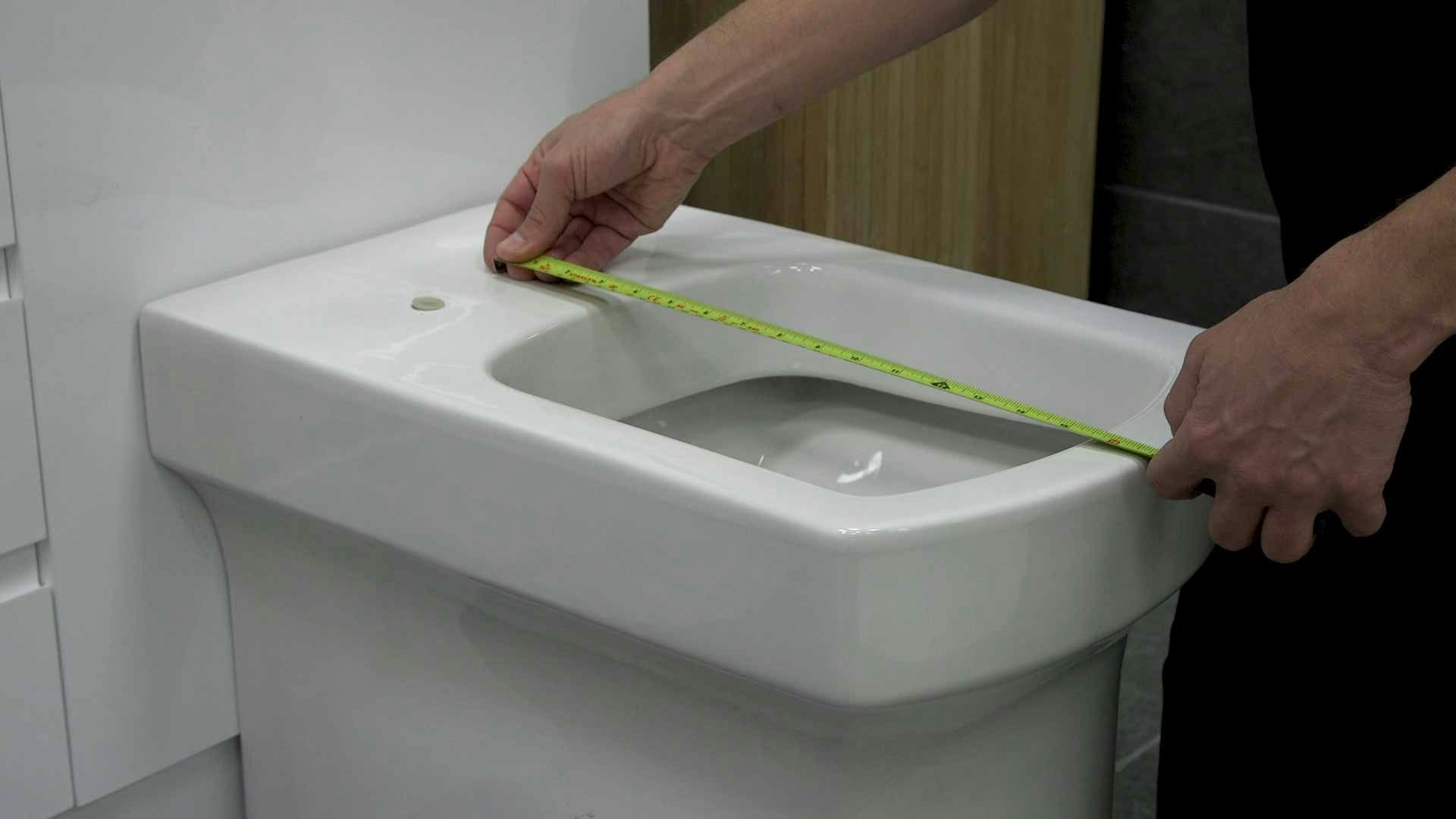 Measuring length of toilet