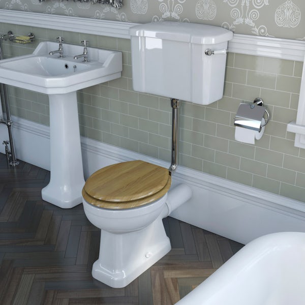 The Bath Co. Camberley low level toilet with wooden soft close seat oak effect and pan connector