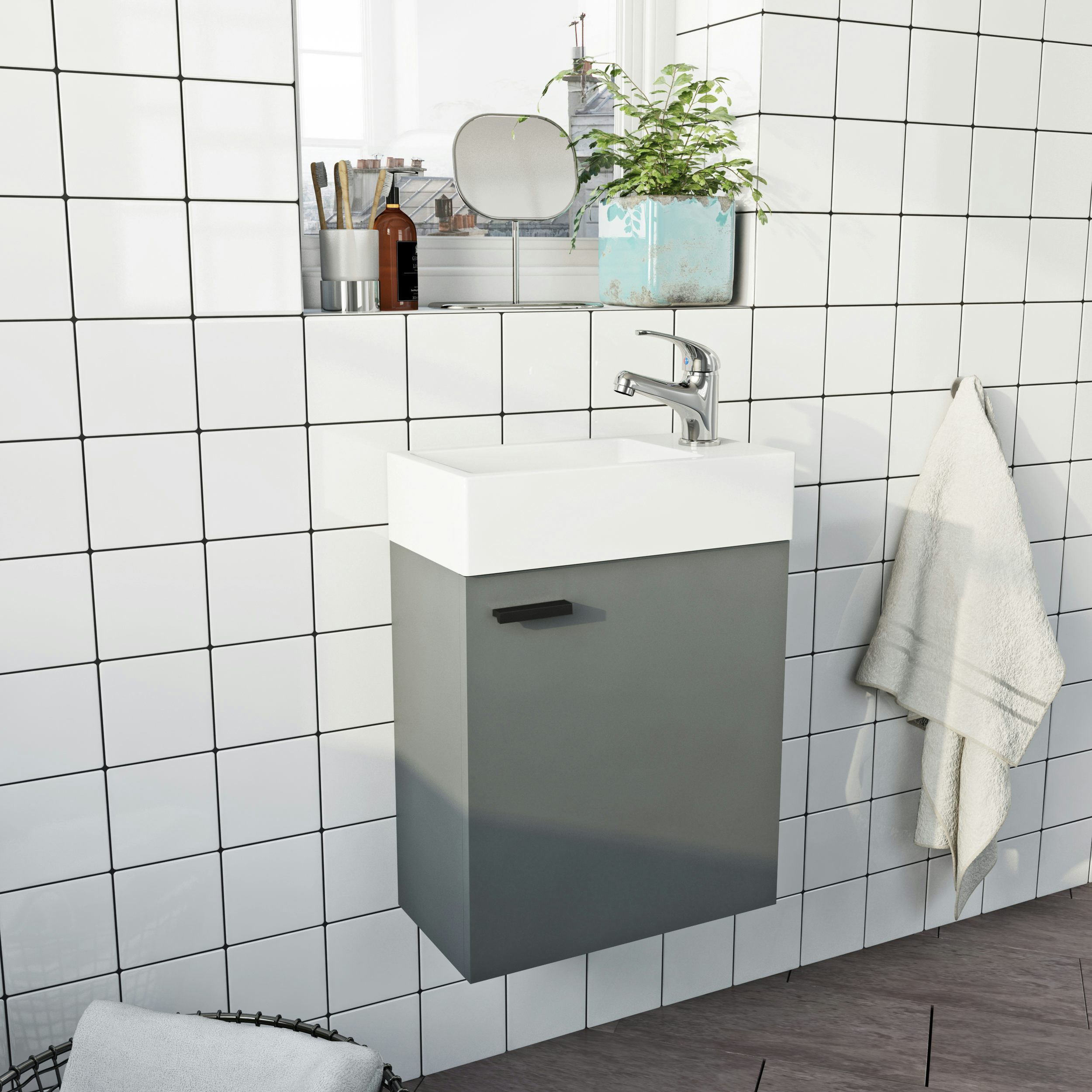 Clarity Compact satin grey wall hung cloakroom suite with contemporary close coupled toilet and black handles