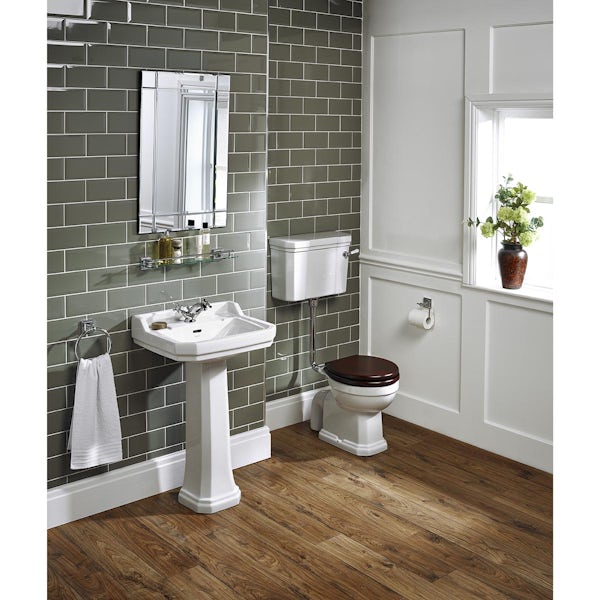 Ideal Standard low level toilet with ornate brackets and mahogany toilet seat