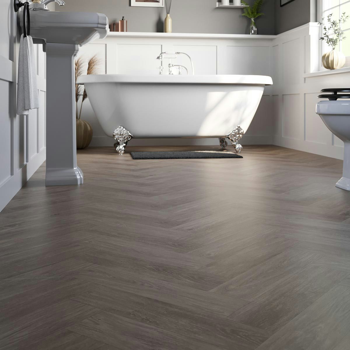 Calcolo Kasba warm walnut herringbone water resistant laminate flooring ...