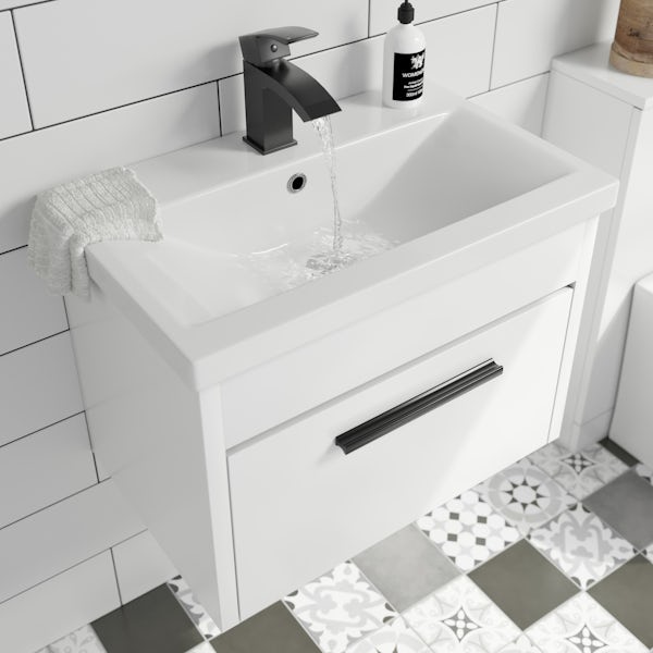 Clarity white wall hung vanity unit and ceramic basin 600mm with tap and black handles