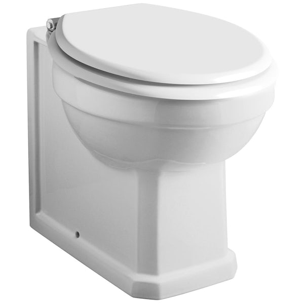 The Bath Co. traditional back to wall toilet and white soft close seat