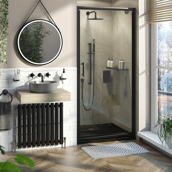 Orchard 6mm matt black pivot shower door with black anti slip shower tray
