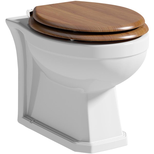 The Bath Co. Camberley back to wall toilet with oak effect soft close seat and concealed cistern